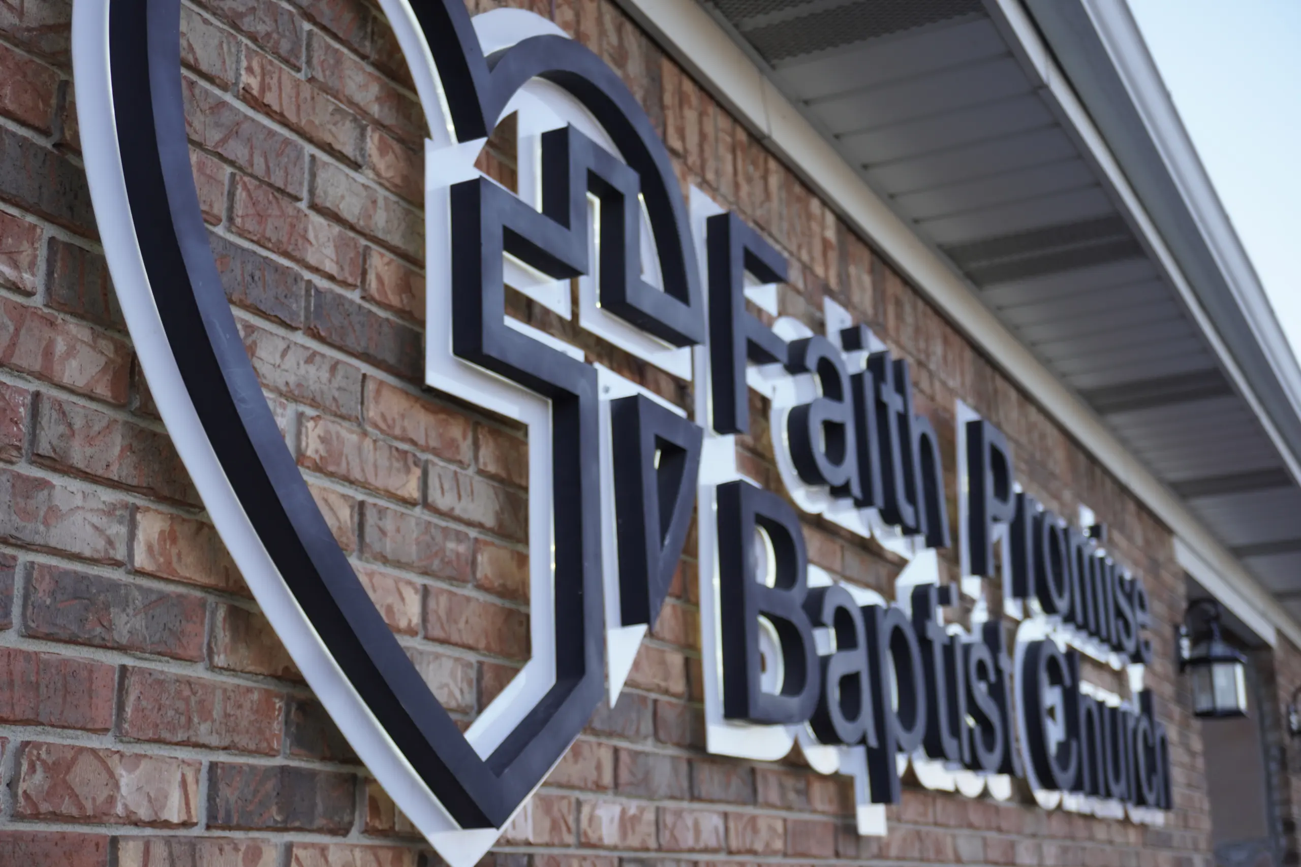 The sign on Faith Promise Baptist Church's wall.